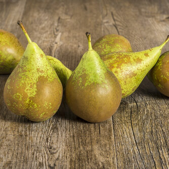 Conference,Pears,On,Rustic,Wood